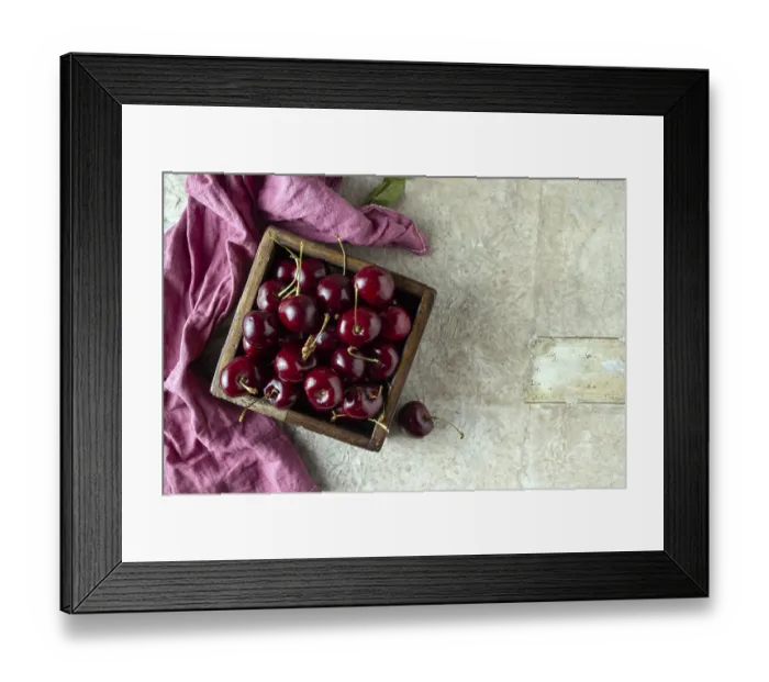 Framed Print : Ripe cherries lie in a wooden square box
