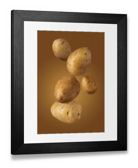 Framed Print : Large ripe potatoes flies on a beige background Framed Print : Large ripe potatoes flies on a beige background