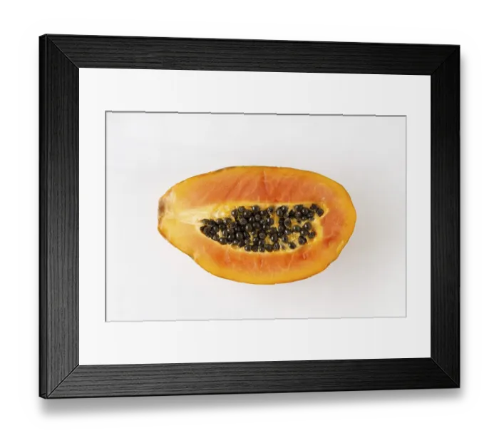 Framed Print : Papaya on a white background, close-up, flat lay