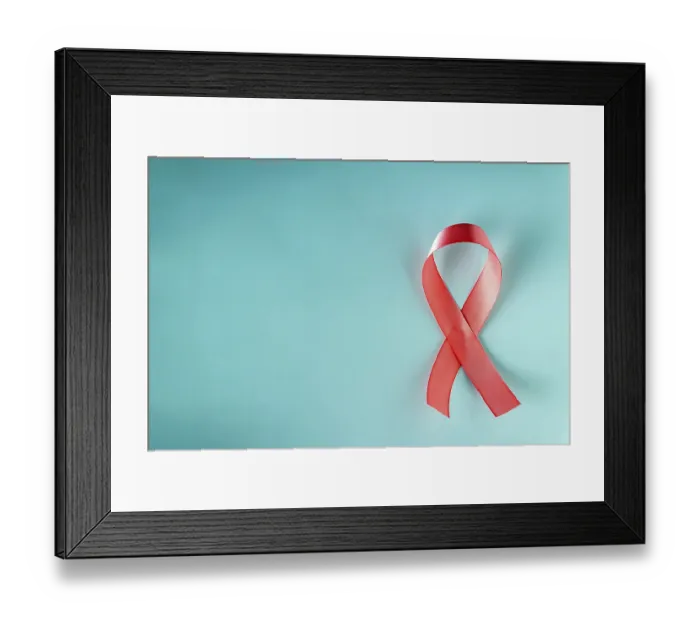 Framed Print : Pink ribbon - a symbol of the fight against breast cancer on a blue background