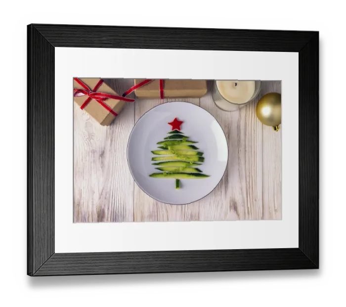 Framed Print : Christmas tree is made of cucumber pieces and lies on a plate