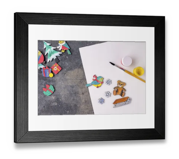 Framed Print : The process of painting wooden toys for the Christmas tree