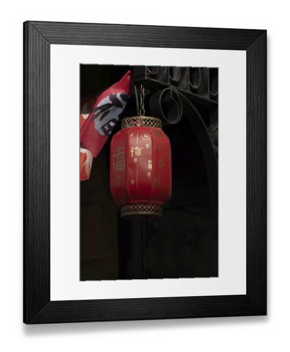 Framed Print : Red fabric chinese lantern hanging over porch