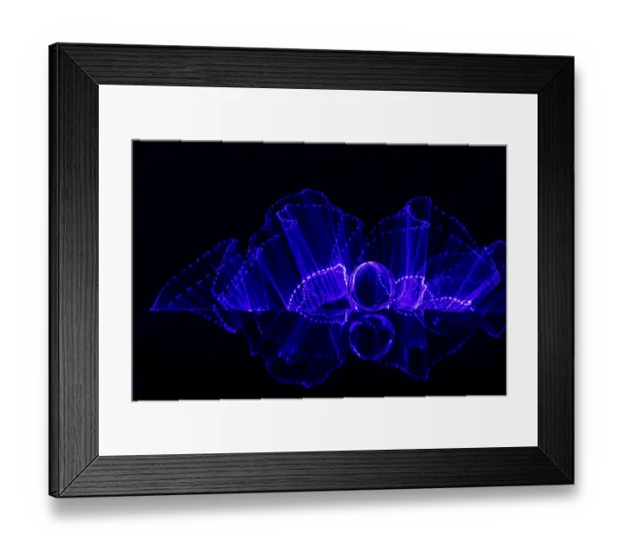 Framed Print : Luminous purple lines and a sphere create a futuristic atmosphere on a black background Framed Print : Luminous purple lines and a sphere create a futuristic atmosphere on a black background