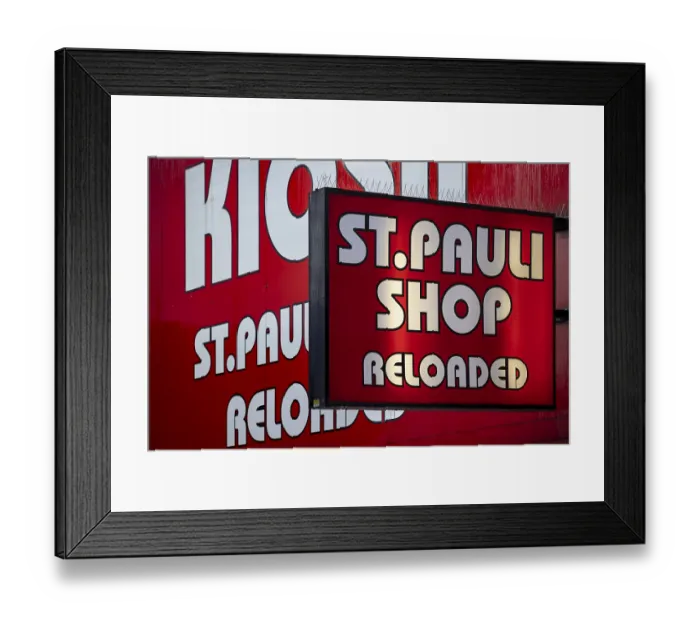 Framed Print : Red advertising sign on St. Pauli with large Framed Print : Red advertising sign on St. Pauli with large