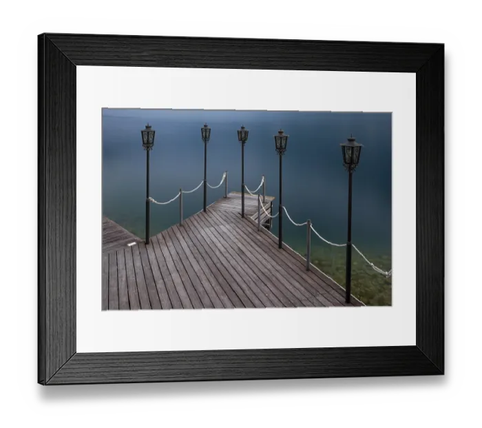 Framed Print : Jetty with lamps jutting out into calm blue water