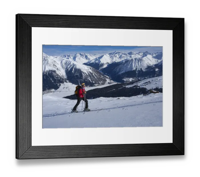 Framed Print : Ski tourer in an ascent track, in the valley Lake Reschen
