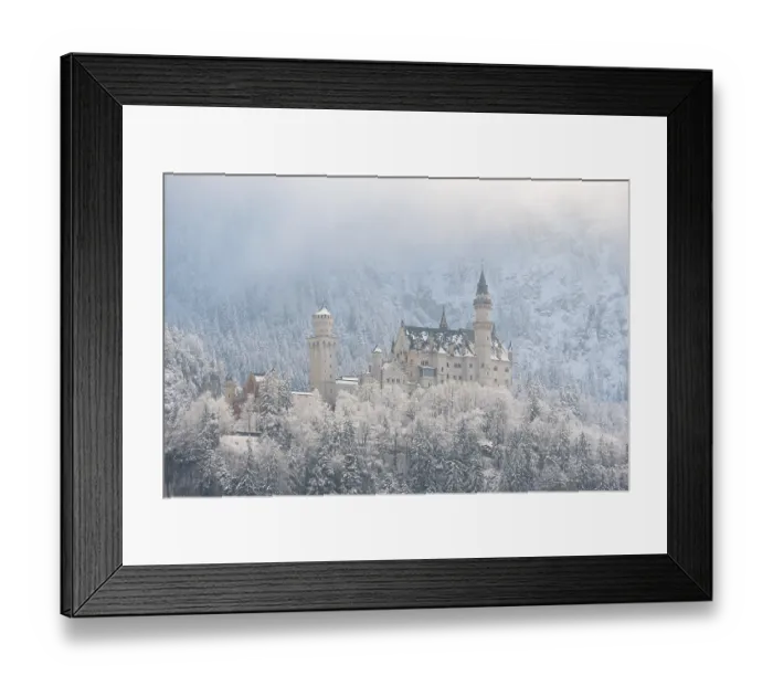 Framed Print : Snow-covered castle in a winter forest