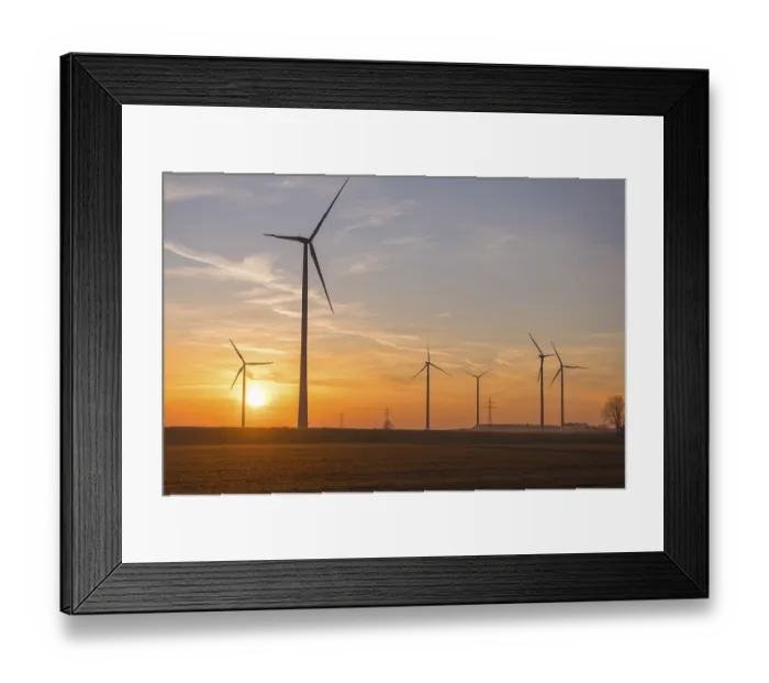 Framed Print : Sunset landscape with several wind turbines in the foreground