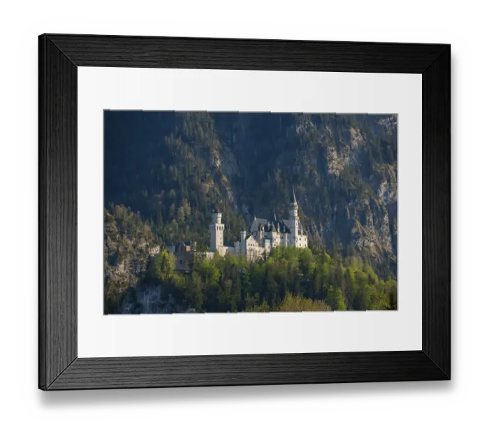 Framed Print : Romantic Neuschwanstein Castle surrounded by forests and mountains Framed Print : Romantic Neuschwanstein Castle surrounded by forests and mountains