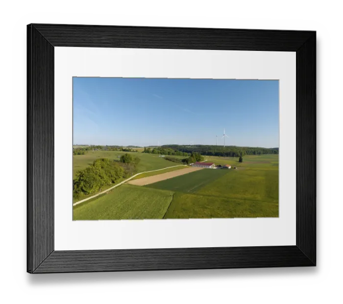 Framed Print : Farm, green fields stretch out under a blue sky