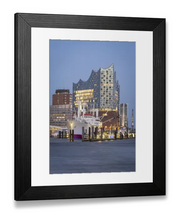 Framed Print : View of Hamburg's harbour with the Elbphilharmonie and Cap San Diego at the blue hour at the Landungsbrucken
