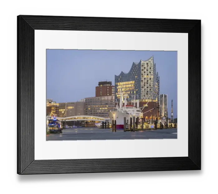 Framed Print : View of Hamburg's harbour with the Elbphilharmonie and Cap San Diego at the blue hour at the Landungsbrucken