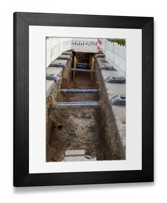 Framed Print : Excavation pit with safety barriers