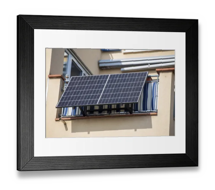 Framed Print : Solar cells on an apartment building