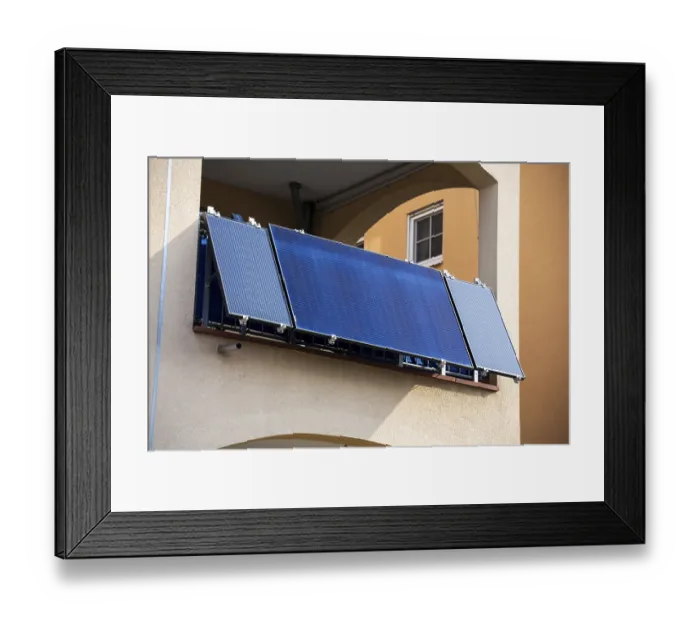 Framed Print : Solar cells on an apartment building