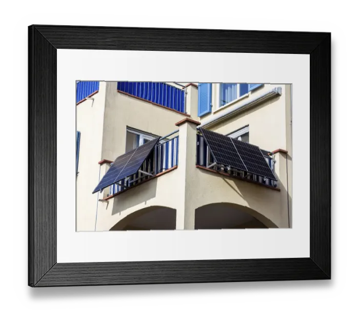 Framed Print : Solar cells on an apartment building