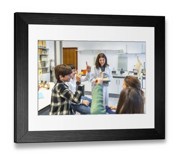 Framed Print : Middle school students participating in anatomy class Framed Print : Middle school students participating in anatomy class