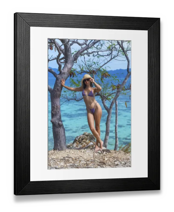 Framed Print : Young woman wearing bikini and straw hat posing on a tropical beach in coron island Framed Print : Young woman wearing bikini and straw hat posing on a tropical beach in coron island