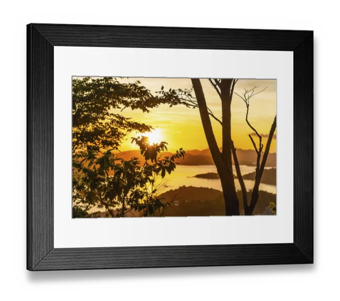 Framed Print : Majestic golden sunset illuminating the tranquil waters and lush islands surrounding coron