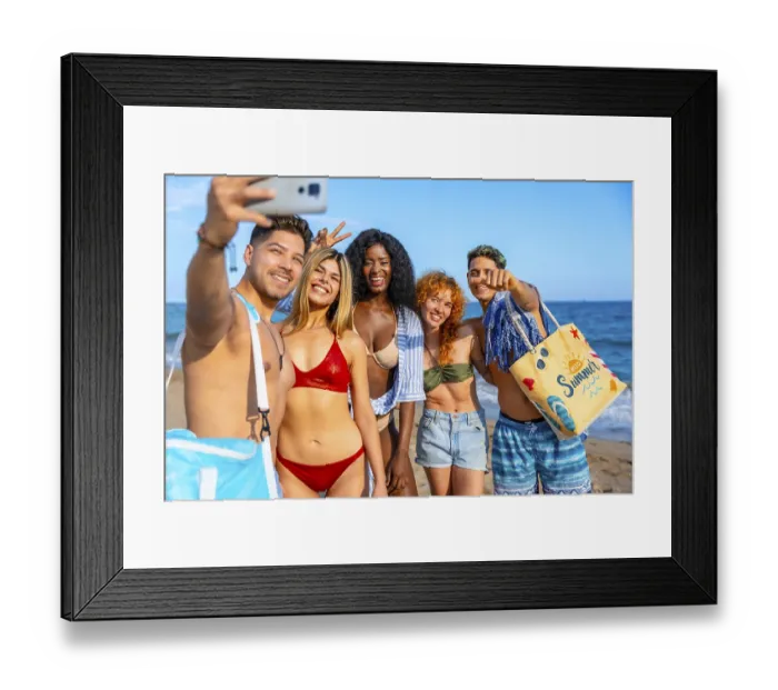 Framed Print : Group of cheerful multi ethnic friends taking a selfie on the beach Framed Print : Group of cheerful multi ethnic friends taking a selfie on the beach