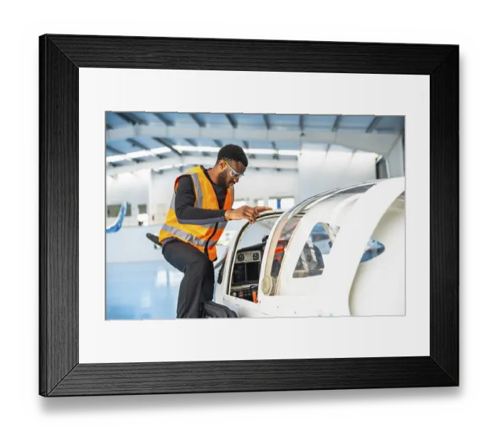 Framed Print : Aircraft maintenance engineer wearing safety glasses