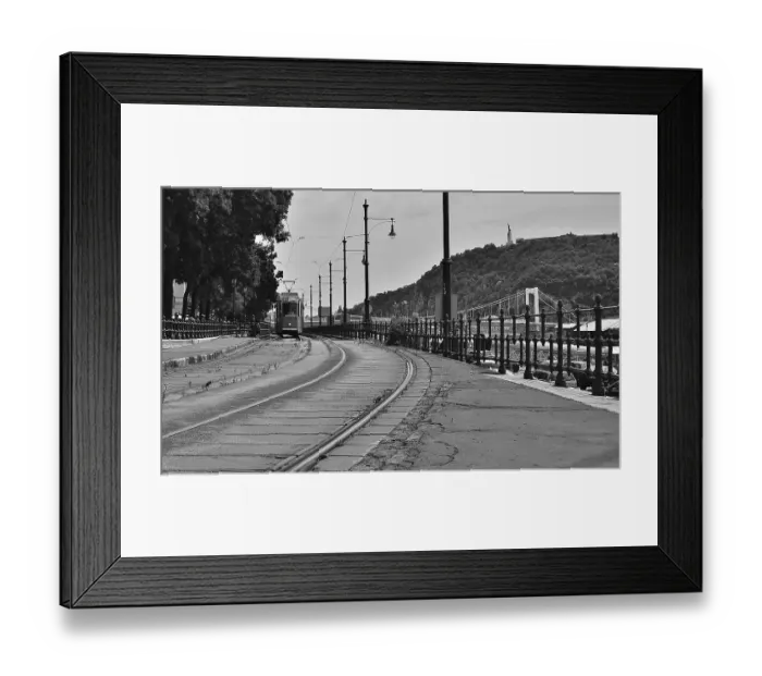 Framed Print : Black and white image of an old tram approaching on tram tracks in budapest Framed Print : Black and white image of an old tram approaching on tram tracks in budapest