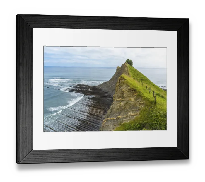 Framed Print : Breathtaking view of the flysch cliffs meeting the ocean waves at sakoneta beach Framed Print : Breathtaking view of the flysch cliffs meeting the ocean waves at sakoneta beach
