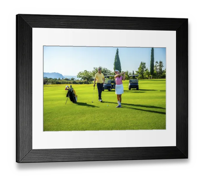 Framed Print : Couple enjoying a sunny day on the golf course
