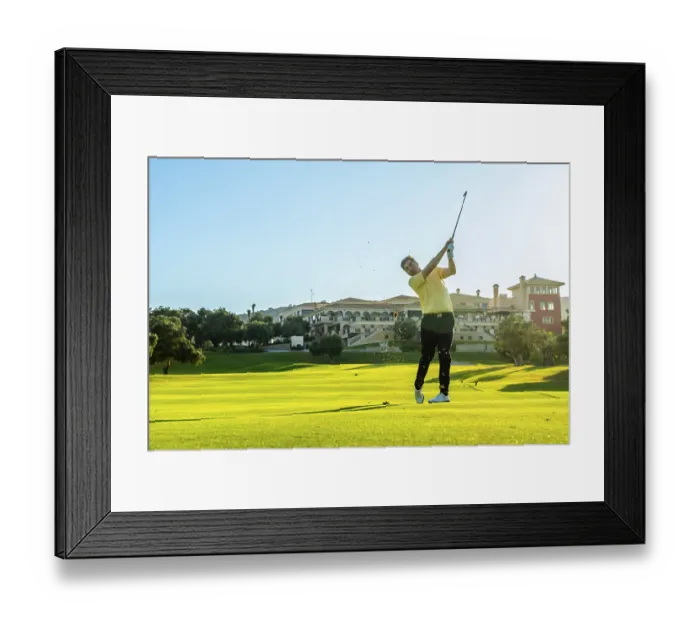 Framed Print : Professional golfer swinging his club Framed Print : Professional golfer swinging his club