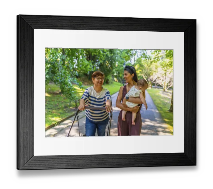 Framed Print : Grandmother, mother, and baby girl enjoying a sunny day at the park Framed Print : Grandmother, mother, and baby girl enjoying a sunny day at the park