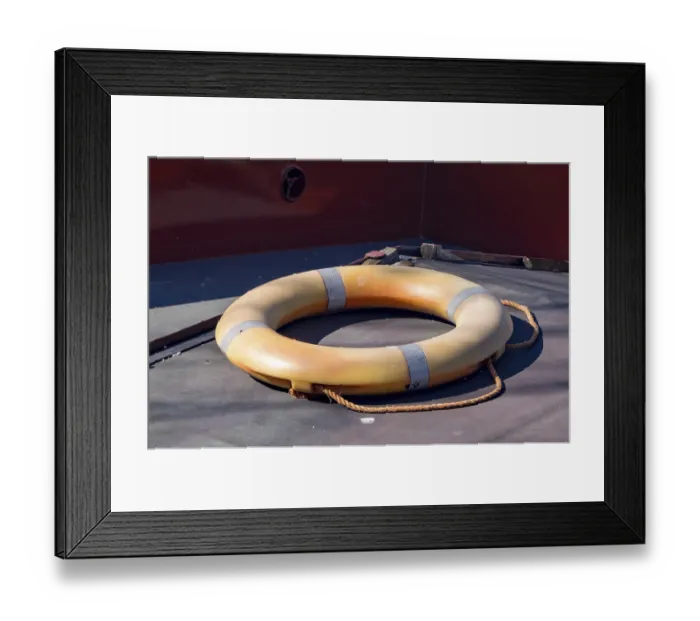 Framed Print : Orange lifebuoy with rope on deck of ship