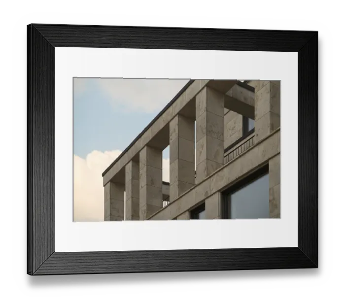 Framed Print : Architectural detail of a contemporary building showcasing travertine cladding and minimalist design