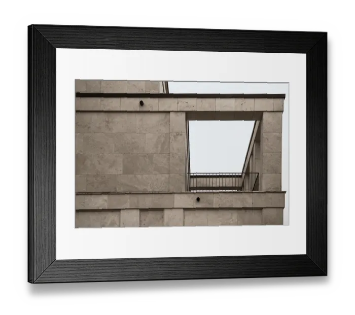 Framed Print : Architectural detail of a contemporary building featuring travertine cladding and a minimalist metal railing Framed Print : Architectural detail of a contemporary building featuring travertine cladding and a minimalist metal railing