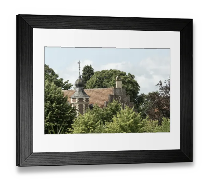 Framed Print : Beautiful european castle with a slate and tile roof