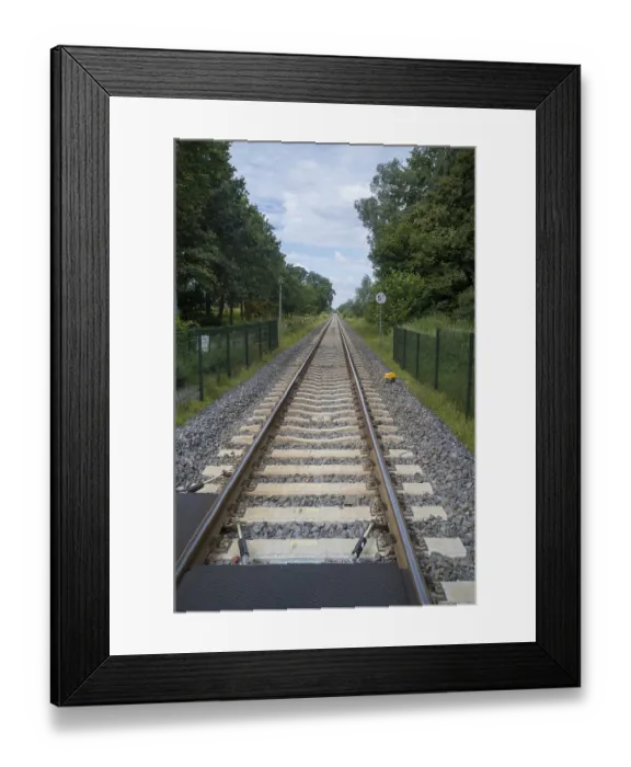 Framed Print : Railroad tracks stretching far into the distance