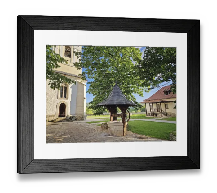 Framed Print : Traditional old well made of wood and stone