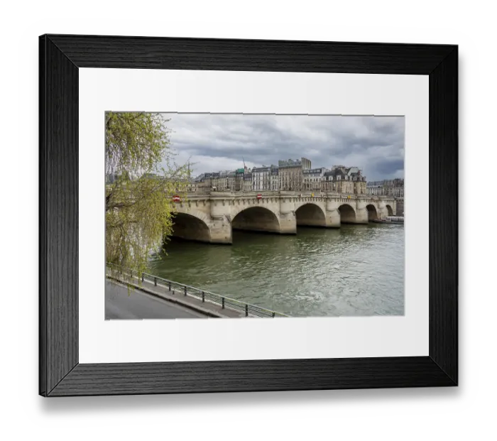 Framed Print : Historic Paris bridge over the river Sena on a cloudy day