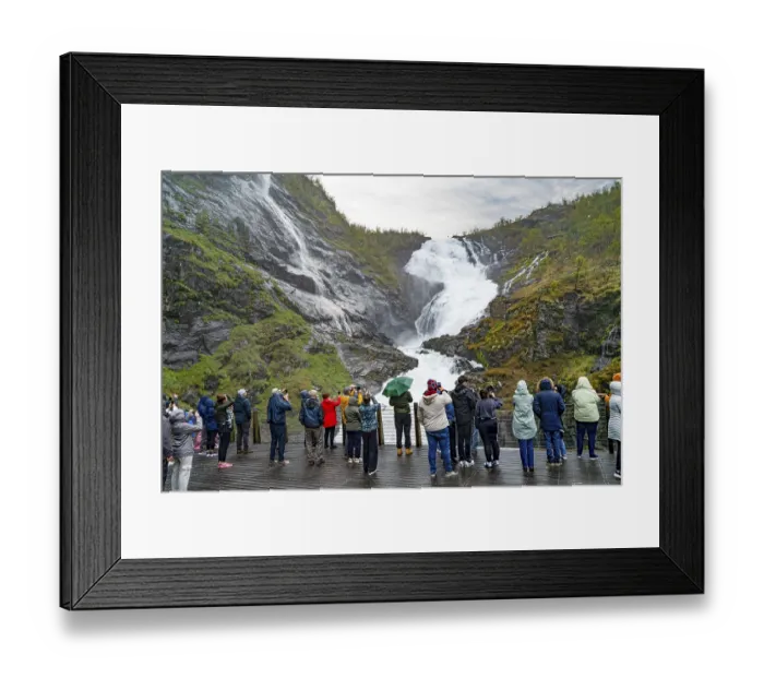 Framed Print : Tourists admiring powerful Kjosfossen waterfall in majestic Norwegian landscape