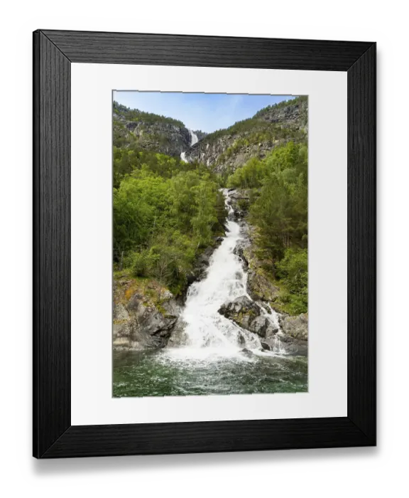Framed Print : Melting snow waterfall flowing into Naeroyfjord Framed Print : Melting snow waterfall flowing into Naeroyfjord