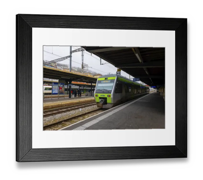 Framed Print : Railroad Station with a Train in City of Neuchatel