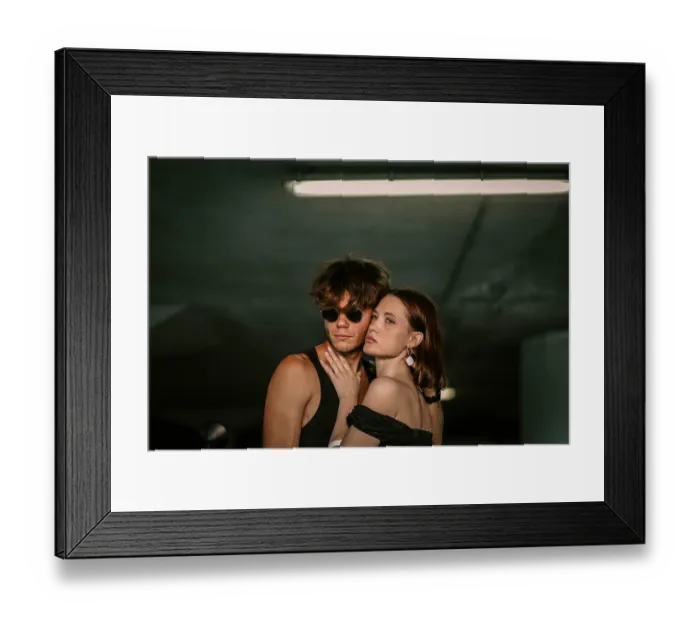 Framed Print : A couple, with one wearing sunglasses