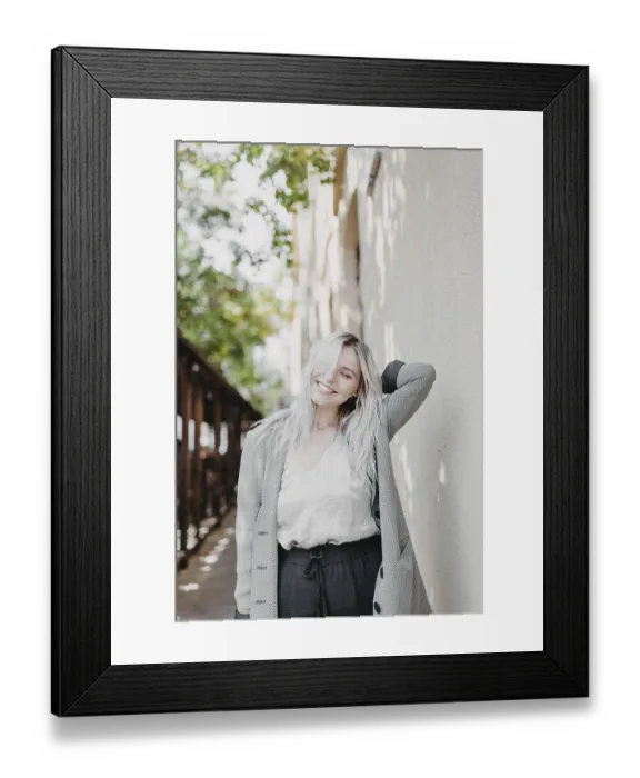 Framed Print : Joyful woman with blonde hair standing casually on a bright sunny day