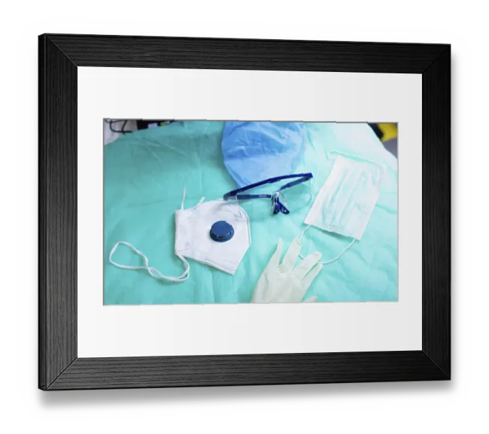Framed Print : Medical mask, gloves, and goggles on a blue surface Framed Print : Medical mask, gloves, and goggles on a blue surface