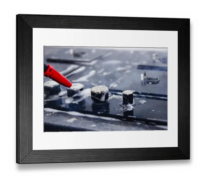 Framed Print : Detailed view of soap-covered stove knobs being cleaned with spray Framed Print : Detailed view of soap-covered stove knobs being cleaned with spray