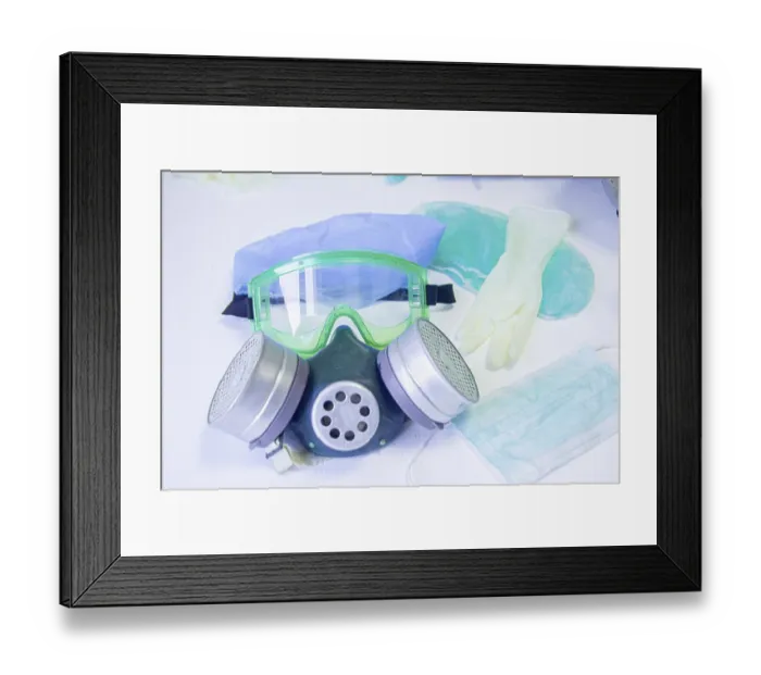 Framed Print : Gas mask with goggles and sterile gloves arranged on white background