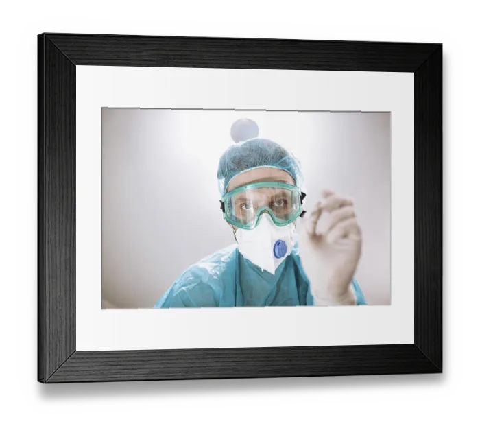 Framed Print : A healthcare worker in protective gear with a determined expression Framed Print : A healthcare worker in protective gear with a determined expression