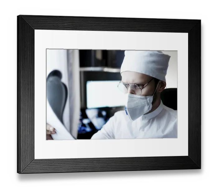Framed Print : Doctor wearing protective gear