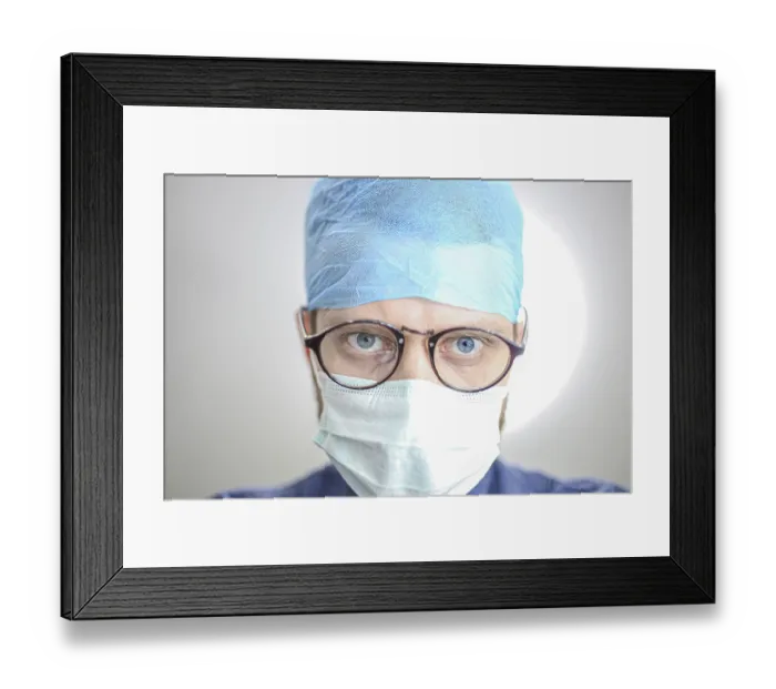 Framed Print : Close-up of a surgeon with blue cap