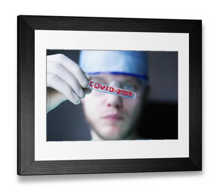 Framed Print : Person with test tube labeled COVID-2019 Framed Print : Person with test tube labeled COVID-2019
